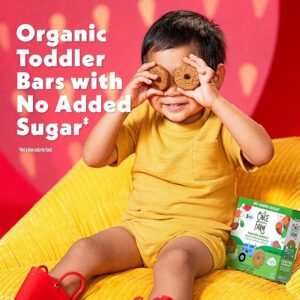 Toddler enjoying Once Upon a Farm Organic Tractor Wheels Bar healthy snack