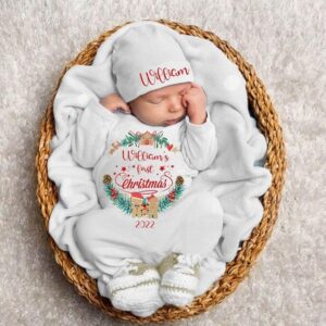 Newborn wearing Personalized My 1st Christmas Baby Grow and Hat Set for first Christmas