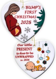 Heart's Sign 2-in-1 Ceramic Bumps First Christmas Ornament 2025 — Baby On The Way Ornament displayed on a Christmas tree