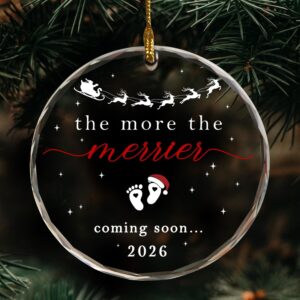 The More The Merrier Ornament Baby Coming Soon 2026 hanging on Christmas tree