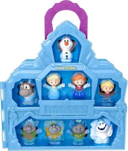 Fisher-Price Little People Disney Frozen Carry Along Castle Case Playset with Elsa, Anna and Olaf figures — toddler holding the purple castle case.