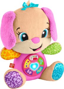 Fisher-Price Laugh & Learn Smart Stages Sis pink plush musical learning toy with light-up heart and belly buttons.