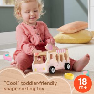 Fisher-Price wooden ice cream truck shape sorter with nine colorful wooden pieces and removable lid.