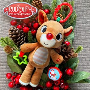 Baby holding Rudolph 12 inch on the go teether sensory toy